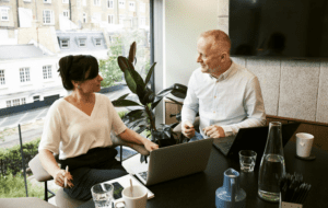 man and woman talking